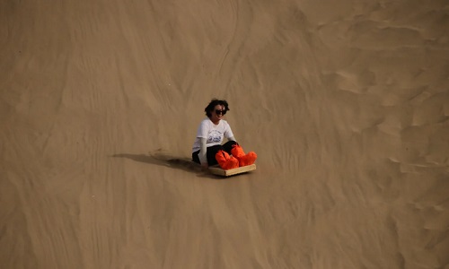 Dunhuang-tour-Sandboarding-at-Mingsha-Mountain Dunhuang-tour-Sandboarding-at-Mingsha-Mountain