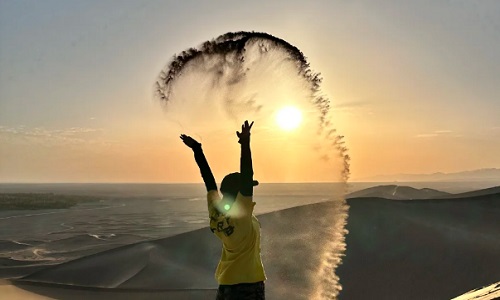 Sandboarding-at-Mingsha-Mountain Sandboarding-at-Mingsha-Mountain